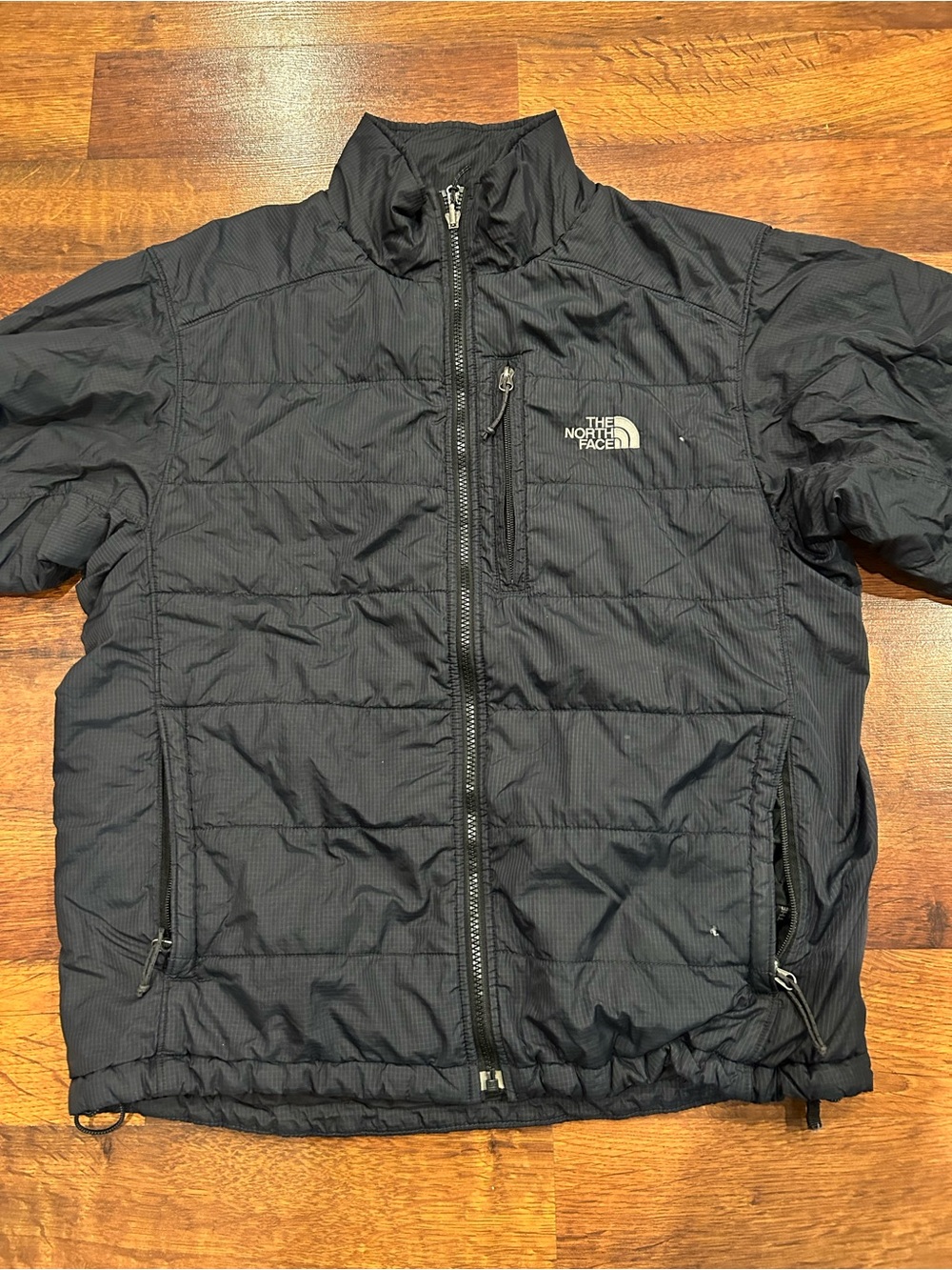 The North Face Men’s Black Puffer Jacket Full Zip Size Medium *small holes*